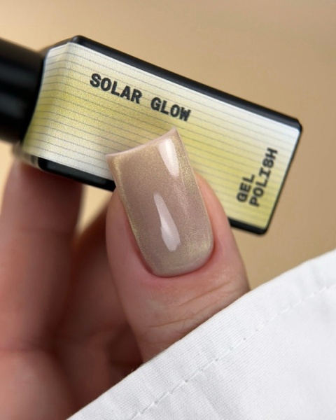 BIBLIOTEKA Cat Eye Gel Polish 10 Solar Glow, 10 ml - złoty lakier hybrydowy z efektem „kociego oka”