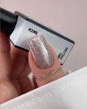 BIBLIOTEKA Cat Eye Gel Polish 25 Rime, 10 ml - szaro-srebrny lakier hybrydowy z efektem „kociego oka”